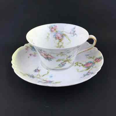 Haviland Limoges cup and saucer with flowers, c. early 1900s