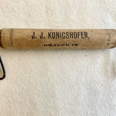 Advertising package grip issued by J. J. Konigshofer, early 1900s