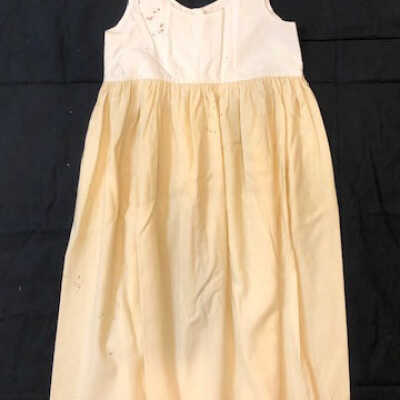 Petticoat with white cotton bodice and cream wook skirt, marked 'Stewart', c. 1900s
