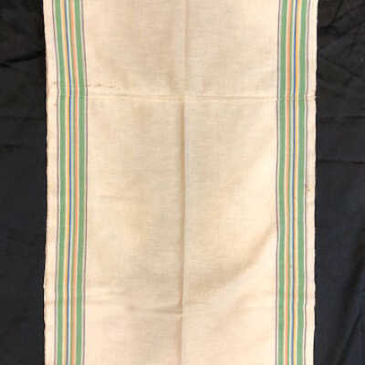 Roller Towel with black, green, orange and blue stripes of Mrs. Linderman