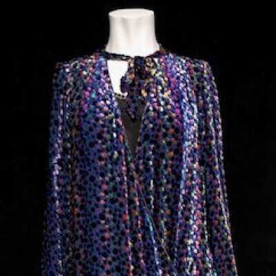 Evening jacket of multi-colored confetti design on deep blue georgette, c. 1930s