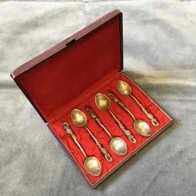 Brown leather box with Yokohama chrysanthemum spoons, c. 1930s