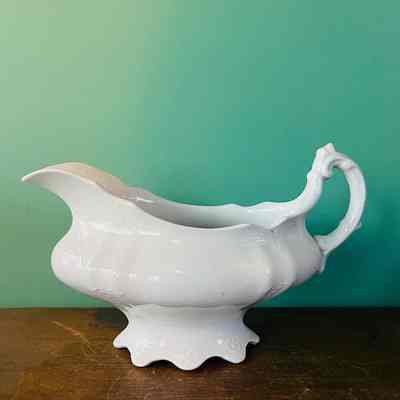 Semi porcelain Ironstone china gravy dish, c. 1908