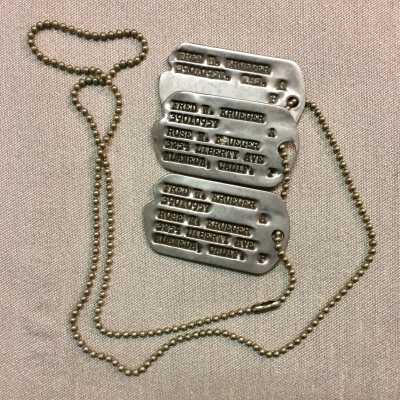 Military 'Dog' Tags of Fred Krueger, #390-10957, 1941-1945