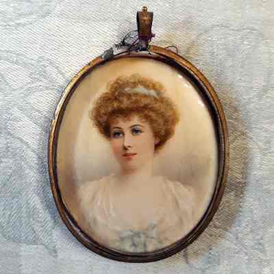 Oval ivory miniature in 18th century style brass frame, c. early 1900s