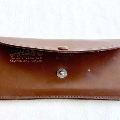 Eyeglass case advertising Donald A. Dowd, Optometrist, prior 2012