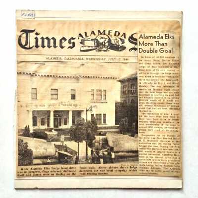 Newspaper clipping showing the Elks building decorated, 1944