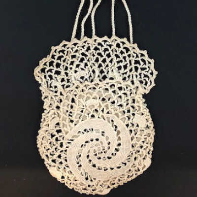 Miniature crocheted change purse of Adeline T. Cox, 1900-1920