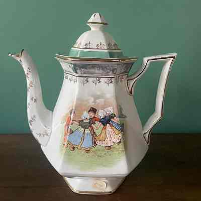 Semi-porcelain teapot with children in Dutch costumes, c. early 1900-1920