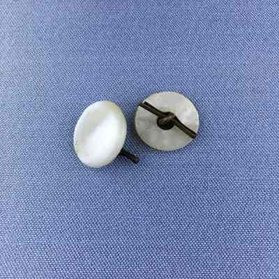 Mother-of-pearl cufflinks or buttons of the Toye/Cox family, early 1900s