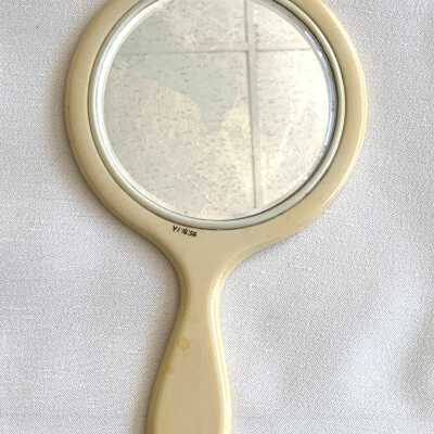 Celluloid Hand Mirror, Comb, and Nail buffer of Yvonne Smith, 1915-1920
