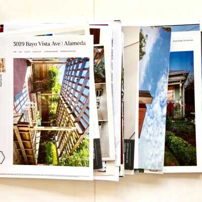Folder with Real Estate flyers, c. 2000-2021