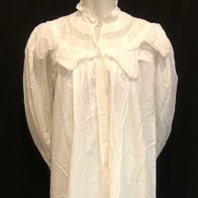 Full length white cotton nightgown of Sophia May, c. 1910