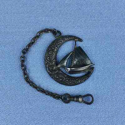 Ladies' watch chain and fob with crescent moon and sailboat, c. 1890s