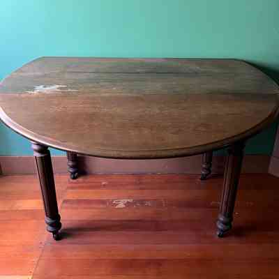 American walnut circular drop leaf dining table, 1870-1890