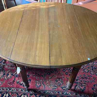 Cottage-style rectangular kitchen table with curved drop-leaves, c. 1890s