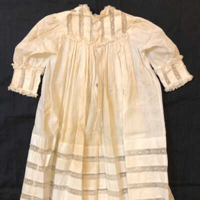 Full length white cotton high waisted baby dress with lace, late 1890s