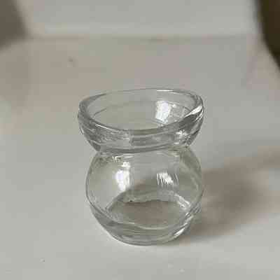 Clear pressed Glasco eye cup of the Blake-Dyer family, c. 1920s