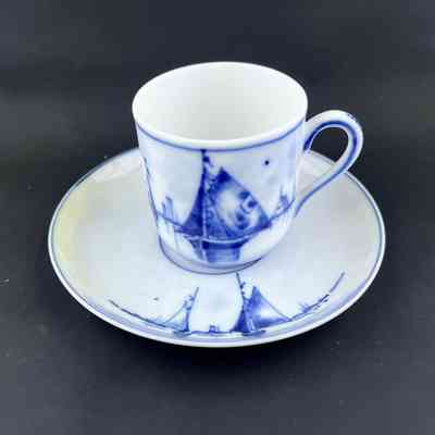 Porcelain demitasse cup and saucer with design of sailboats, early 1900s