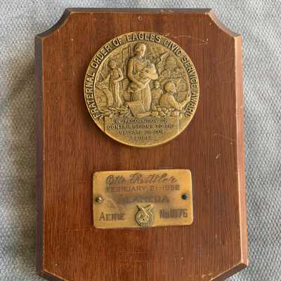 Shield shaped plaque awarded to Otto Rittler for civic service by the Order of Eagles, 1952