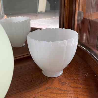 Opaque milk glass electric light shades with fluted design, c. 1951-1920