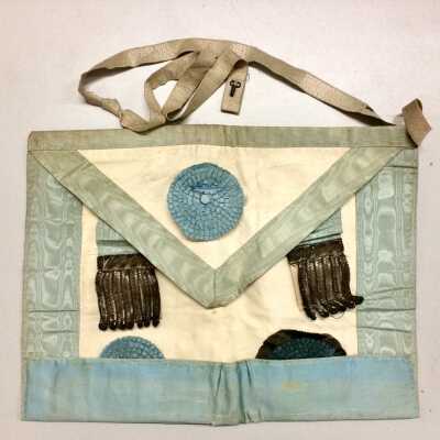 Leather masonic apron trimmed in blue silk with tassels of Captain F. Hunt, c. 1870s
