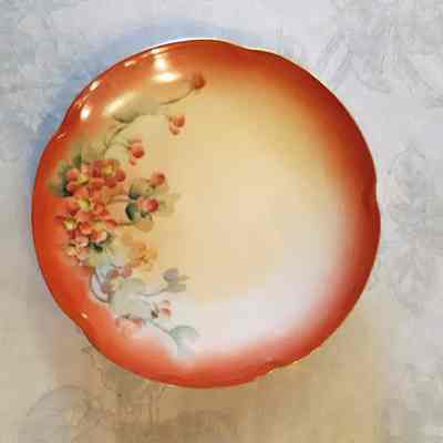 Porcelain dessert plate with design of red flowers, c. 1915-1920