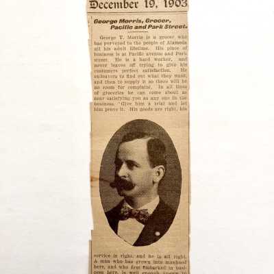 Newspaper clipping about George T. Morris and his grocery store, 1903