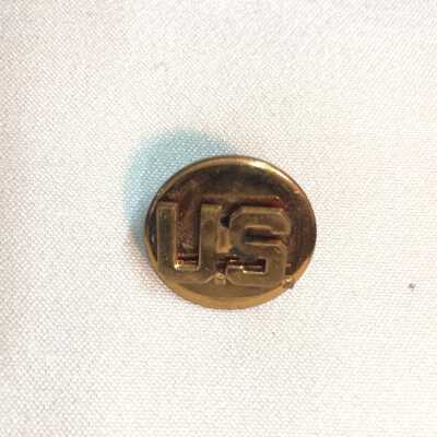 US Army insignia button of Fred W. Krueger, 1941-1945