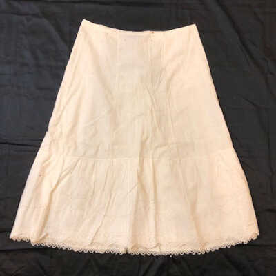 White cotton half petticoat with embroidered eyelet lace flounce, early 1900s