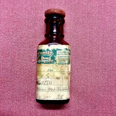 Red Mercurochrome bottle from the Security Drug Company, Inc, 1925