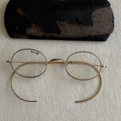Gold rim eyeglasses with oval lenses, c. 1920s