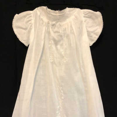 White cotton child's dress worn by Frank Perkins, 1927