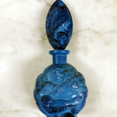 Pressed glass perfume bottle with birds and flowers, prior 1997