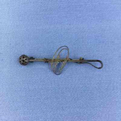 Silver scarf pin of Olive Toye, c. 1890s