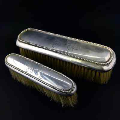 Sterling silver brush set of Neil Macdonald, late 1890s or early 1900s