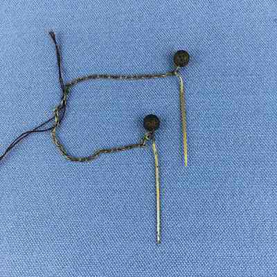 Scarf or tie pins with filligree ball tops and gold plated chain, 1880s-1890s