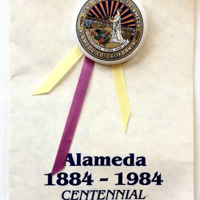 Booklet and pin Centennial Charter Celebration (1884-1984)