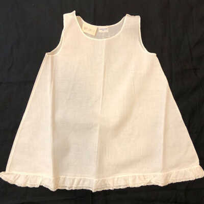 Cotton petticoat with button at shoulder, c. 1930