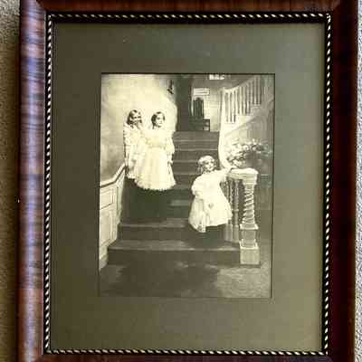 Framed art print of children on a staircase, c. 1912-1915