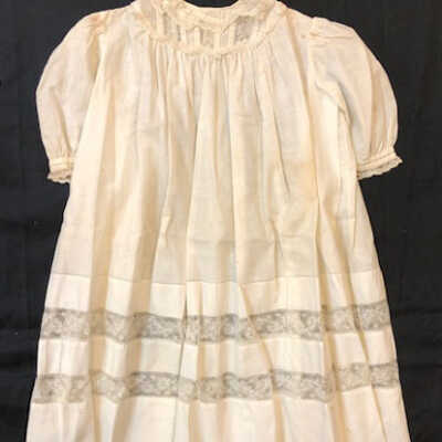 Full length white cotton baby dress with double row of lace, late 1890s