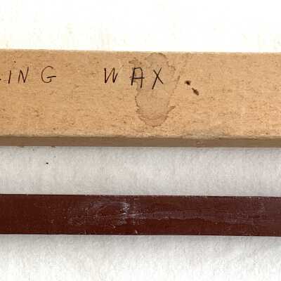 Box with sealing wax to close commuter fare money bags, before 1939