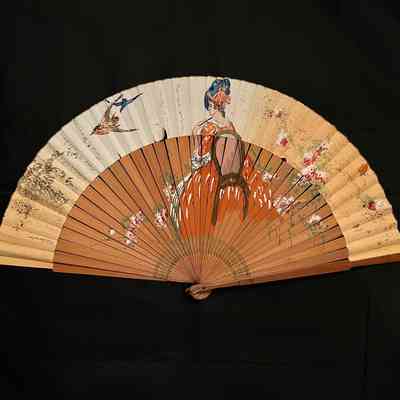 Handpainted paper fan with a woman, birds, and flowers, c. 1916-1917