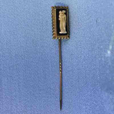 Gold plated stickpin with white cameo of a madonna on onyx, c. 1890s