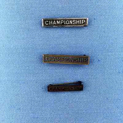 Championship Bar pins won by George Mitchell, c. 1981-1920