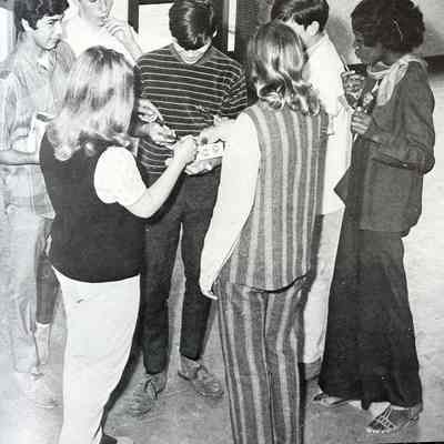 1970 - only a few fashion-forward students are wearing bell-bottom pants.