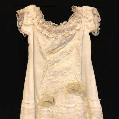 Cream voile Girl's dress with off-white lace and robin's egg-blue silk ribbon trim, 1880