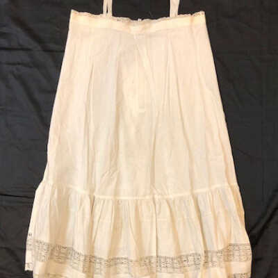 Full white cotton slip with flounce with inset lace, early 1900s