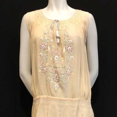 Afternoon dress of peach voile with embroidery, c. 1930