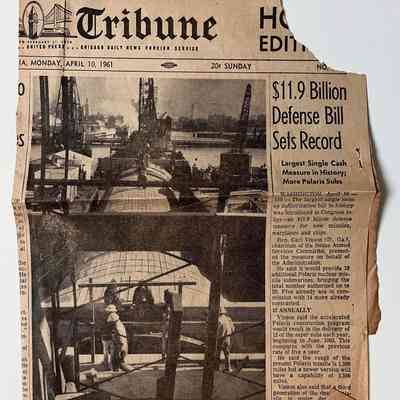 Oakland Tribune Newpaper Clipping showing photo of laying of first tube section, 1961